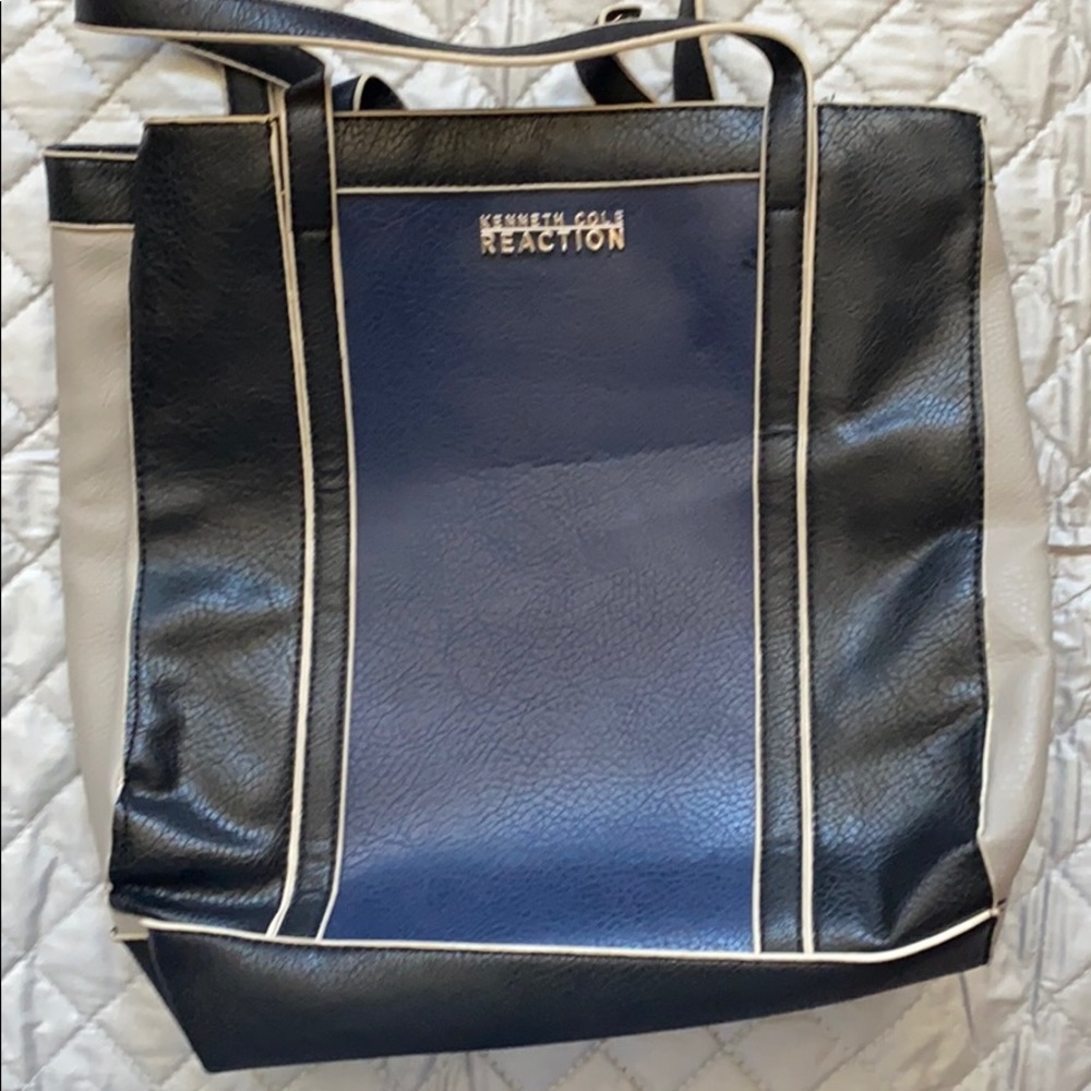 Kenneth Cole over the shoulder bag.